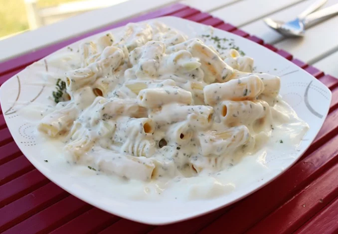 Creamy yogurt pasta recipe: a delectable and indulgent dish with a velvety sauce and flavorful ingredients.